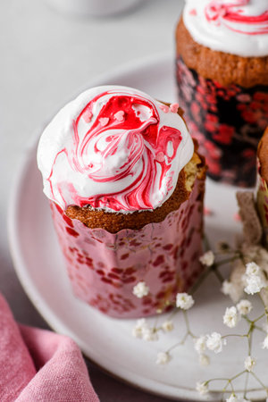 easter cakes with meringue on a light background. high quality photo