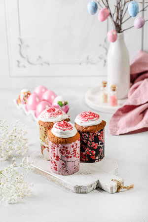easter cakes and eggs at the Easter tree. High quality photo, on light background