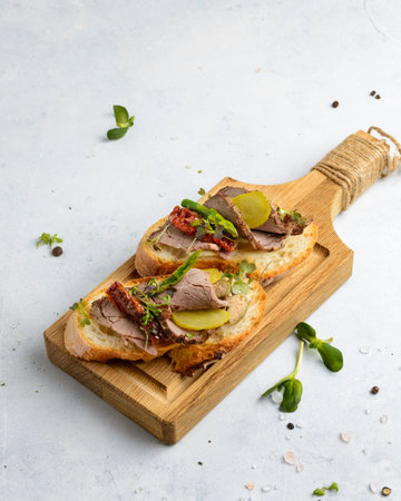 bruschetta with beef and dried tomatoes. high quality photoの写真素材