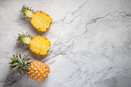 pineapple on a light marble background. high quality photoの写真素材