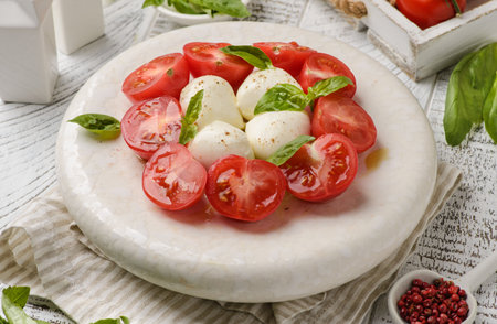 tomatoes with mozzarella and basil. high quality photoの写真素材