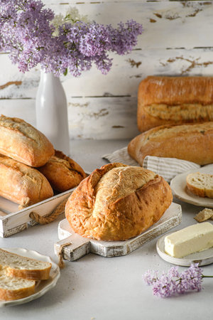 still life with white bread and lilac. high quality photo