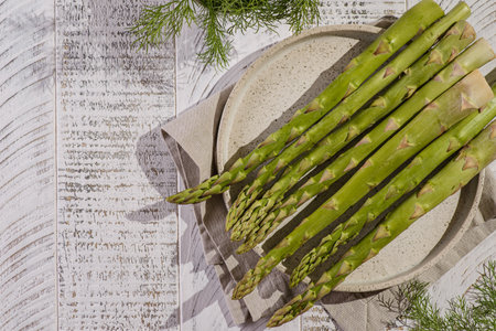 asparagus on a white wooden background. high quality photoの写真素材