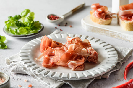 jamon on a light plateの写真素材