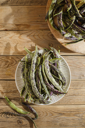 string beans on a wooden background. high quality photo