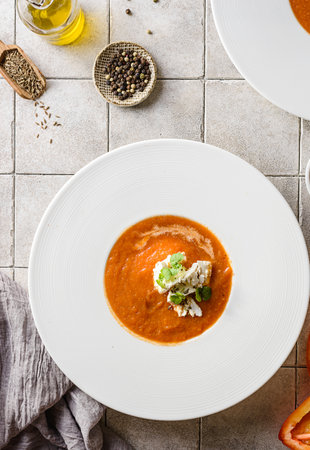 cream soup of baked peppers with paprika and Greek feta cheeseの写真素材