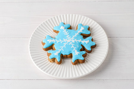 Christmas gingerbread with icing on a white wooden background. High quality photoの写真素材