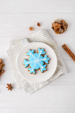 Christmas gingerbread with icing on a white wooden background. High quality photoの写真素材