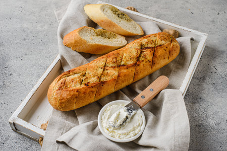 garlic baguette on a gray background. High quality photoの写真素材