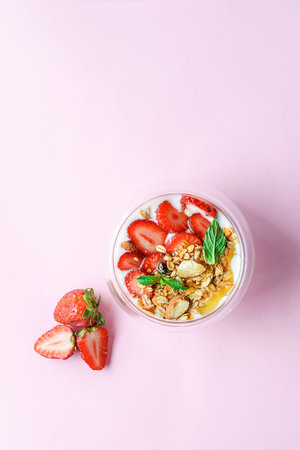 yogurt with strawberries, muesli and honey. High quality photoの写真素材
