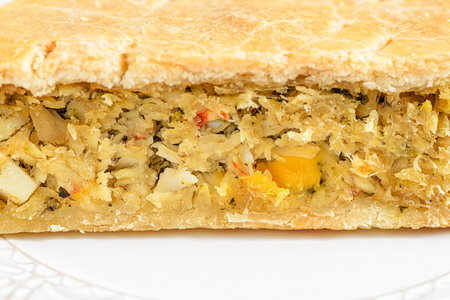 Chicken and egg pie on a light plate. High quality photoの写真素材
