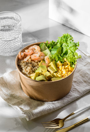 bowl with shrimp, quinoa and corn in a cardboard box. High quality photoの写真素材