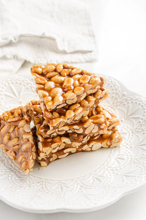 kozinaki dessert made of peanuts and molasses. High quality photo