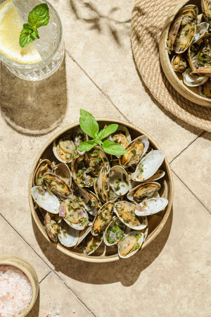 vongole with greenery on a beige background. High quality photoの写真素材