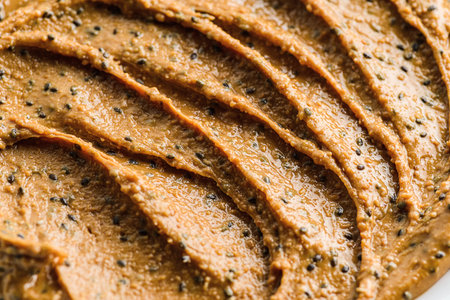 peanut butter with chia on a light background. High quality photo