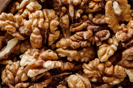 organic raw walnuts in a wooden bowl superfood, vegetarian. High quality photoの写真素材