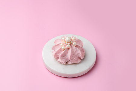 berry marshmallows on a pink background.の写真素材