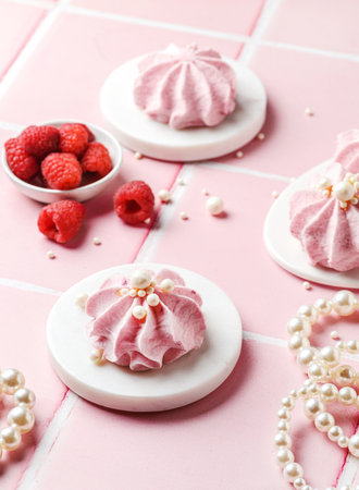 berry marshmallows on a pink background.の写真素材