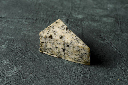 cheese with blue mold on a gray plate. High quality photoの写真素材