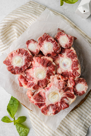raw beef tenderloin on a light backgroundの写真素材
