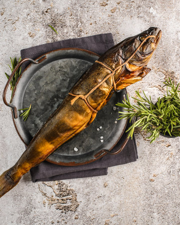 dried smoked fish on the table. High quality photo