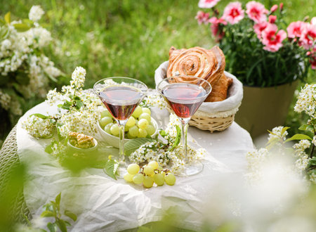 cocktails in the garden on a flower table. High quality photo