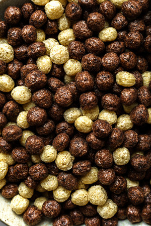 chocolate cereal flakes balls with milk.Breakfast. High quality photo