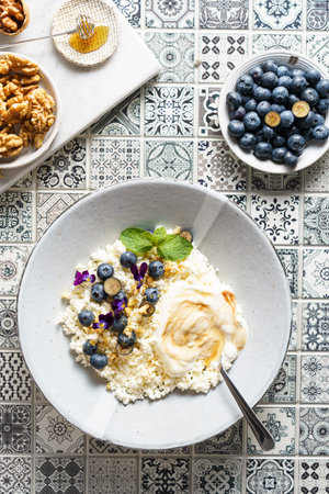 cottage cheese with blueberries and honey. High quality photo