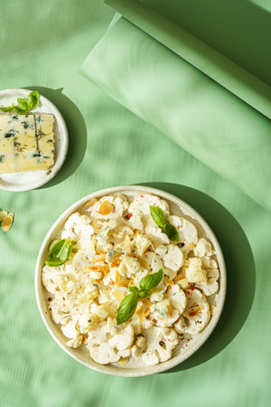 fresh cauliflower salad with cheeseの写真素材