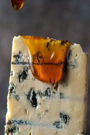 cheese with blue mold dripping honey