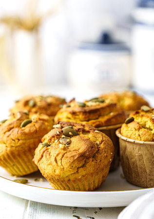 pumpkin muffins on a light background on a plate