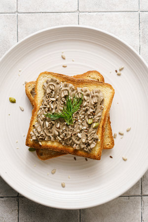 toast with chicken pate garnished with seeds. High quality photoの写真素材