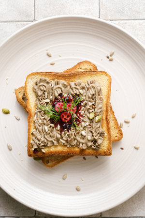 toast with chicken pate and cranberries on a grey background. High quality photoの写真素材
