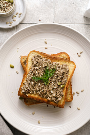 toast with pate garnished with rosemary and seeds. High quality photoの写真素材