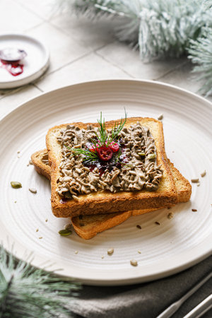 toast with chicken pate and cranberries on a grey background. High quality photoの写真素材