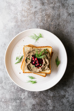toast with chicken pate and lingonberry jam. High quality photoの写真素材