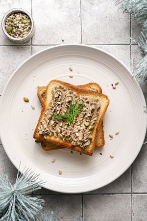 toast with pate garnished with rosemary and seeds. High quality photoの写真素材
