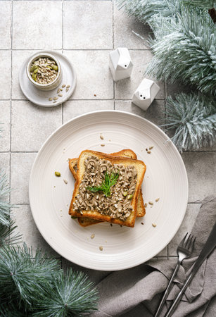 toast with chicken pate garnished with rosemary and seeds. High quality photoの写真素材
