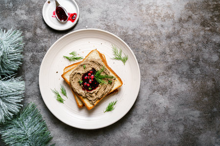 toast with chicken pate and lingonberry jam. High quality photoの写真素材