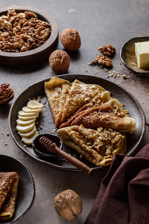 crepes with honey, walnuts and bananasの写真素材