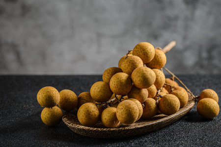 longan on a dark background