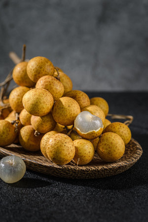 longan on a dark background