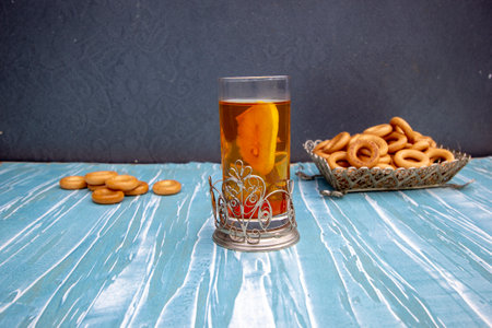 tea with lemon in a glass with a glass holderの写真素材