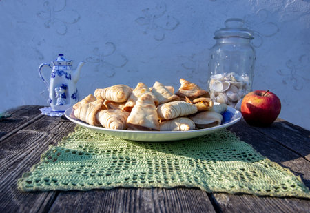 homemade neapolitan puffs on wooden background