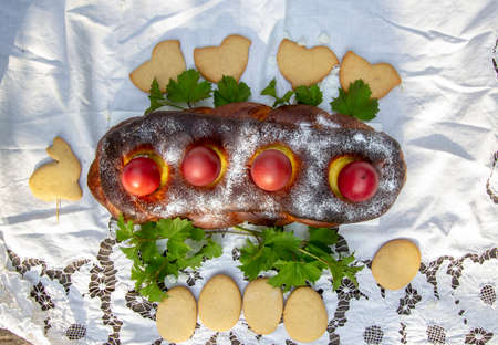 greek easter cake with colored eggsの写真素材