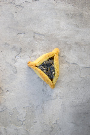hamantaschen cookies. Jewish traditional baked goods for Purim (Jewish carnival holiday with...