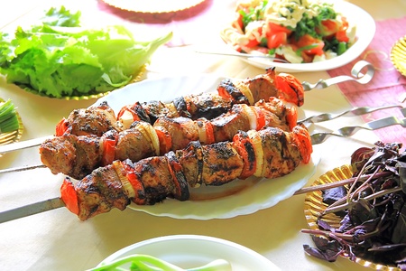 Image with fried meat, tomato and onionの写真素材