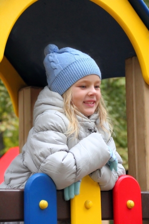 Portrait of beautiful girl with blond hair and blue eyesの写真素材