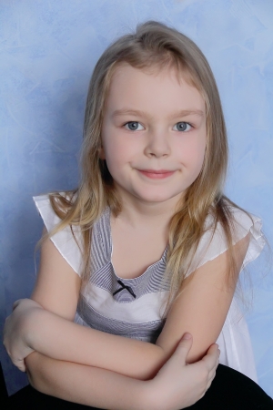 Portrait of beautiful girl with blue eyesの写真素材