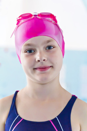 Photo of cute girl in swimming poolの写真素材